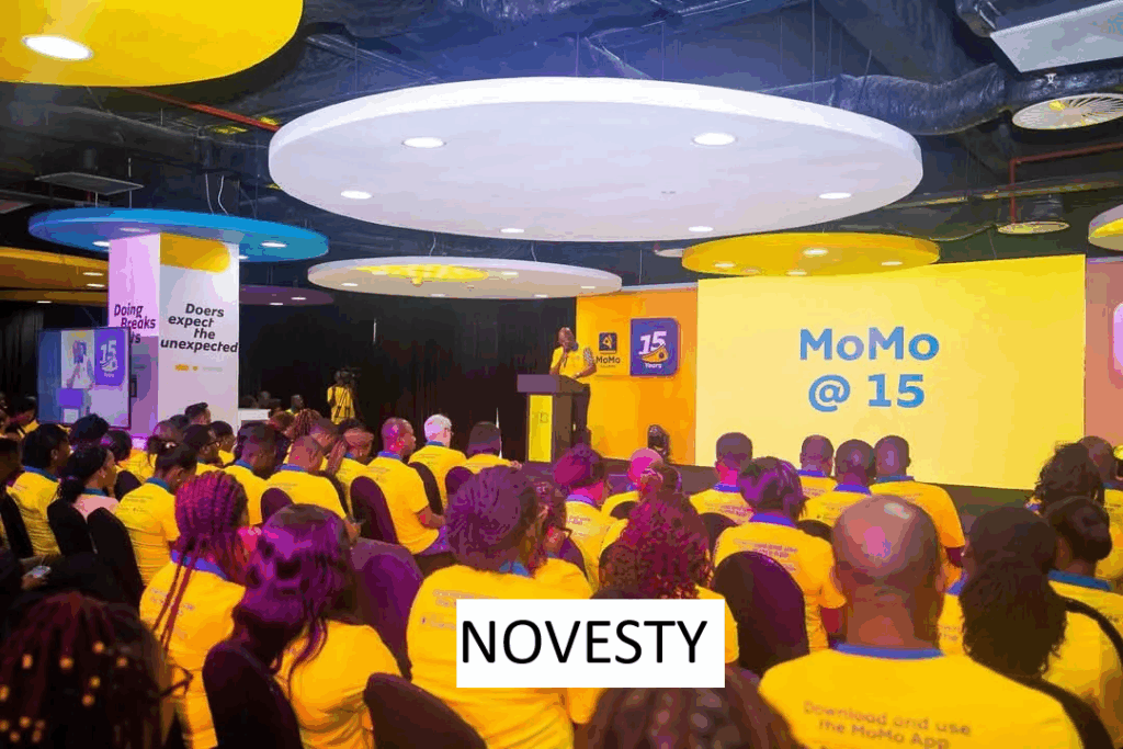 Successful MoMo agent celebrating business milestone with customers