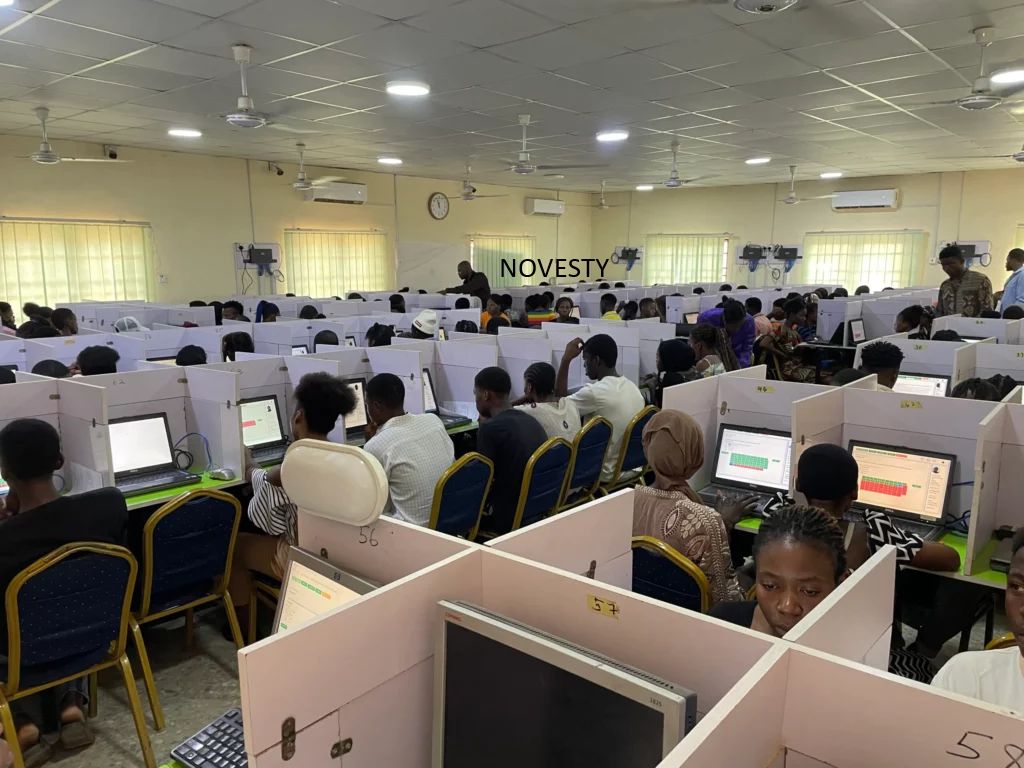 Student using computer for JAMB CBT practice test